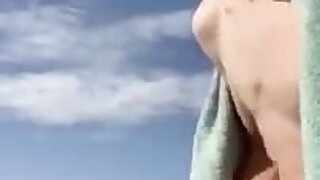 Jerking by the ocean on a Sunny day