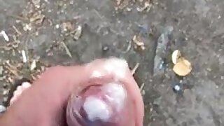 Wank outside thick cum collected in foreskin