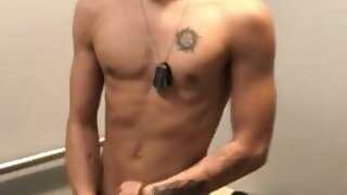 Young man poses, strips, fingers himself & jacks off for older guy with camera in dressing room