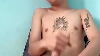 Horny Asian faggot spreads his ass and jerks off