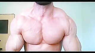 Muscle hunk flexing