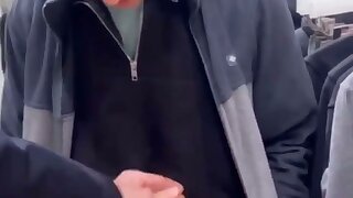 Lad has cock out in store and gets wanked