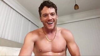 He jerks off in bed while showing off his ass and fingering it over and over again