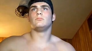 Backwards cap, muscles, pale skin and a hairy hole while he keeps off on cam
